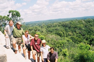 Group on top of Tikal temple, Guatemala