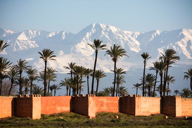The High Atlas Mountains and the city walls of Marrakech