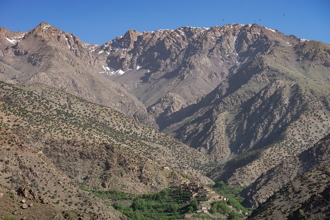 Looking towards the village of Tizi Oussem and the towering Tazaghart Plateau from Azzaden Trekking Lodge