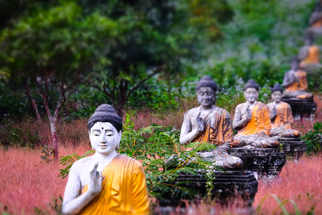 Amazing view of lot Buddhas statues in Loumani Buddha Garden. Hpa-An, Myanmar