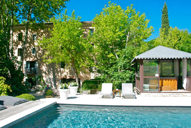 Relax by the pool at the Hotel du Poéte 