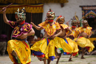 Masked dancers in Bhutan